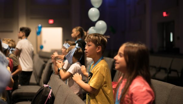 group-of-little-kids-playing-games-dancing-in-cir-2025-04-01-20-00-13-utc